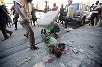 Click image for larger version. 

Name:	Haiti3%20Deadly%20Protest.jpg 
Views:	132 
Size:	48.5 KB 
ID:	11102
