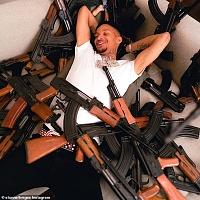 Click image for larger version. 

Name:	rapper_posed_on_the_couch_in_a_pile_of_high_powered_weapons-a-6_1614781006770.jpg 
Views:	28 
Size:	98.1 KB 
ID:	14471