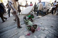 Click image for larger version. 

Name:	Haiti3%20Deadly%20Protest.jpg 
Views:	56 
Size:	57.9 KB 
ID:	24587