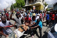 Click image for larger version. 

Name:	project_20190610-two-deaths-as-protesters-burn-tires-block-roads-in-haiti-0001.jpg 
Views:	101 
Size:	176.7 KB 
ID:	7077