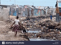 Click image for larger version. 

Name:	haiti-girl-walking-by-open-sewage-in-the-slums-of-of-cite-soleil-port-BTCD3W.jpg 
Views:	111 
Size:	403.4 KB 
ID:	4324