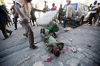 Click image for larger version. 

Name:	Haiti3%20Deadly%20Protest.jpg 
Views:	49 
Size:	57.9 KB 
ID:	24587